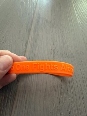 3 Orange Silicone Wristband "No One Fights Alone"